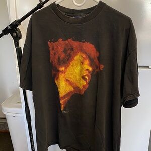 Zion Rootswear Black Tee with Red and Yellow Portrait Graphic